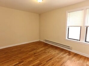 3941 N Janssen Ave, Unit A04C in Chicago, IL - Building Photo - Building Photo