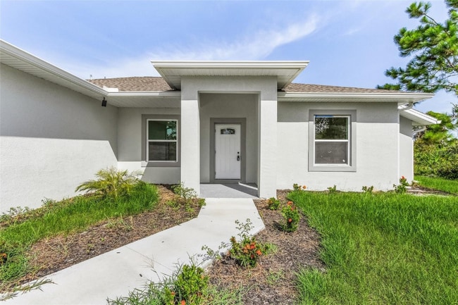 9225 Arberg St in Port Charlotte, FL - Foto de edificio - Building Photo