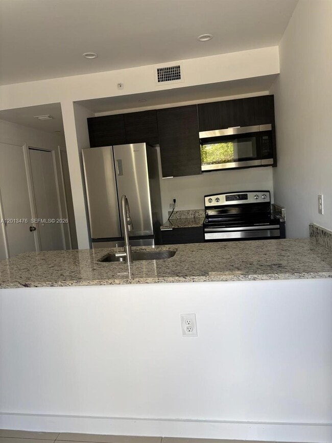 property at 423 E 27th St