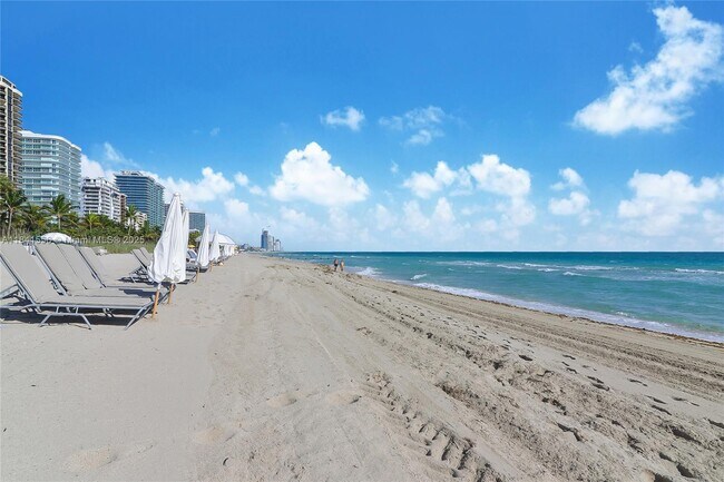 property at 9801 Collins Ave