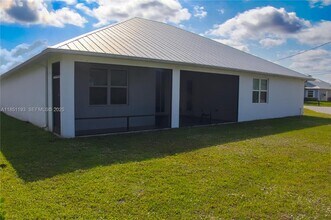 5231 NW Iredell St in Port St. Lucie, FL - Building Photo - Building Photo