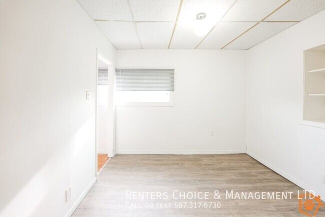 Cat-Friendly Downtown Taber Apartment with Laundry Access in Taber, AB - Building Photo - Building Photo