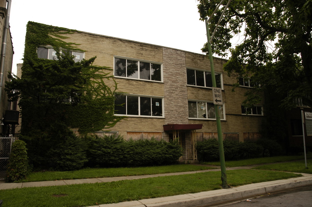 7115 S Oglesby Ave in Chicago, IL - Building Photo