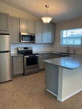 1487 SW Leisure Ln in Port St. Lucie, FL - Building Photo - Building Photo