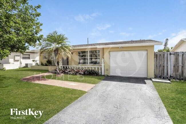 property at 9540 NW 25th St