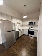 37 Kirk St, Unit 31-2 in Lowell, MA - Foto de edificio - Building Photo