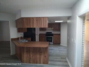 765 John Carroll Ln in Melbourne, FL - Foto de edificio - Building Photo