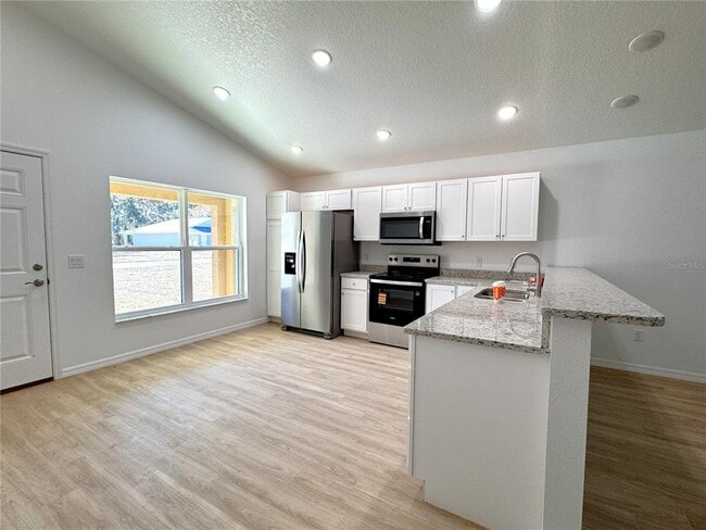 8815 E Albertson Ct in Floral City, FL - Building Photo - Building Photo