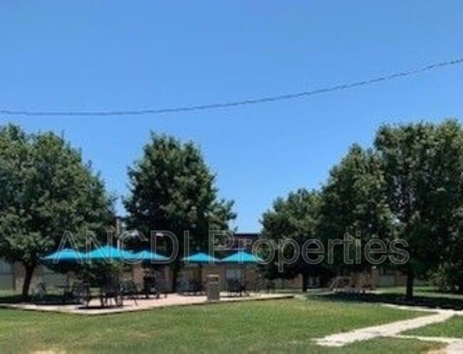 property at 801 E 9th St