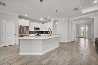 17550 Elkgrove Ln in Estero, FL - Building Photo - Building Photo