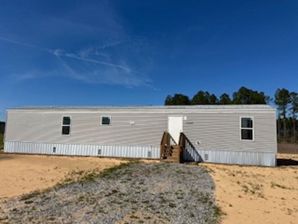 1245 Reeves Rd in Baker, FL - Building Photo
