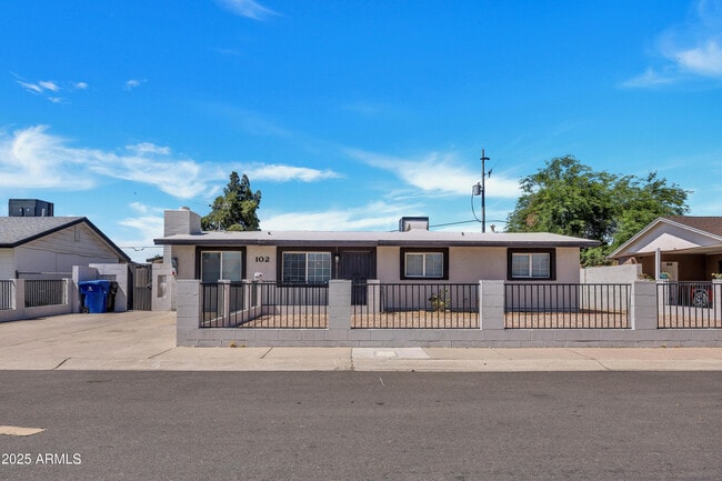 property at 102 W Holly Ln