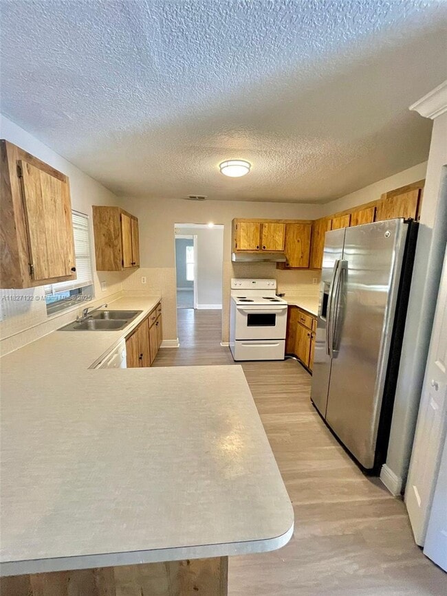 4718 Blue Pine Cir in Greenacres, FL - Foto de edificio - Building Photo