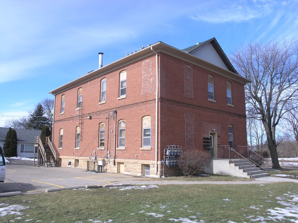 The Canfield Apartments in Owatonna, MN - Building Photo