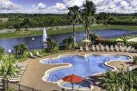 Resort-style pool with heated spa - Reserve At Beachline Apartments in Orlando, Florida