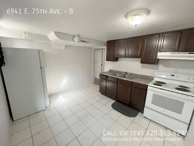 property at 6941 E 75th Ave