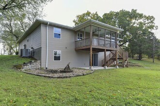 1791 Fruit Farm Rd in Hollister, MO - Building Photo - Building Photo