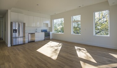 Spacious Bedroom + Private Bathroom // Sun... in Washington, DC - Building Photo - Building Photo