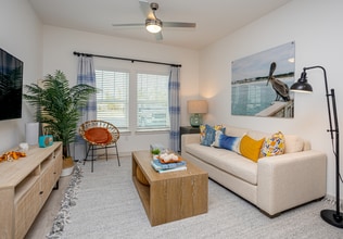 East Bay Flats Apartments in Parker, FL - Building Photo - Building Photo