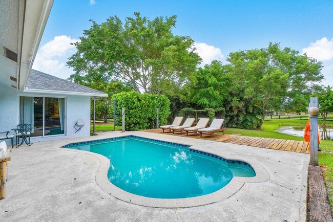 16881 Rustic Rd in Wellington, FL - Building Photo - Building Photo