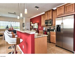 8570 Evernia Ct-Unit -201 in Bonita Springs, FL - Foto de edificio - Building Photo