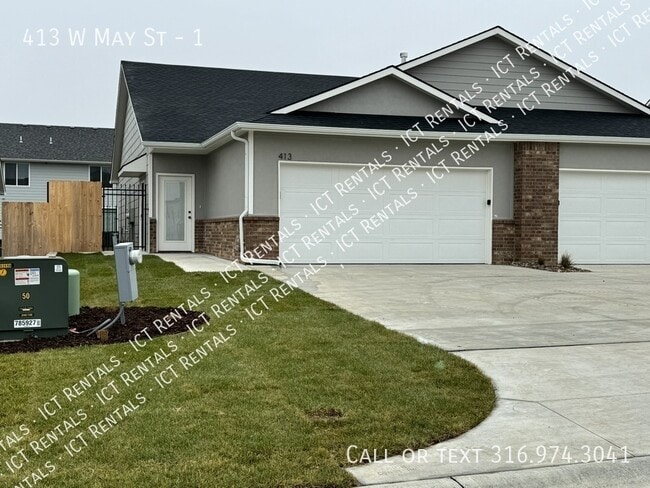 property at 413 W May St