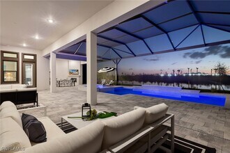 15429 Turin Dr in Naples, FL - Building Photo - Building Photo