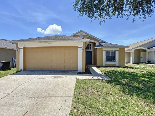 137 Piano Ln in Davenport, FL - Foto de edificio - Building Photo