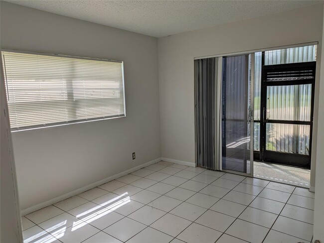 4133 NW 88th Ave, Unit 101 in Coral Springs, FL - Building Photo - Building Photo