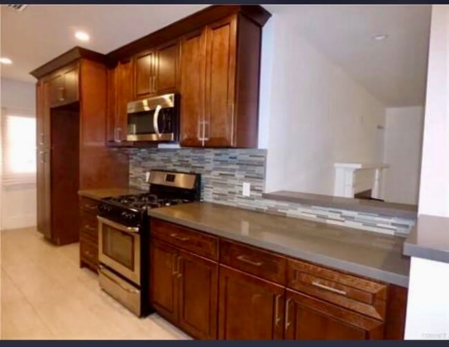7723 Wish Ave in Van Nuys, CA - Building Photo - Building Photo