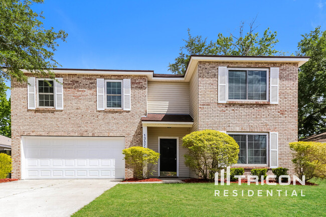 property at 13571 Ashford Wood Ct W