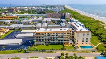 3060 N Atlantic Ave, Unit 111 in Cocoa Beach, FL - Building Photo