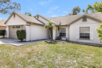 10244 Rainbow Oaks Dr, Unit 303 in Hudson, FL - Building Photo - Building Photo