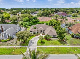 13656 Carlton St in Wellington, FL - Building Photo