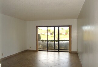 723 Sunny Pine Way in Greenacres, FL - Building Photo - Building Photo