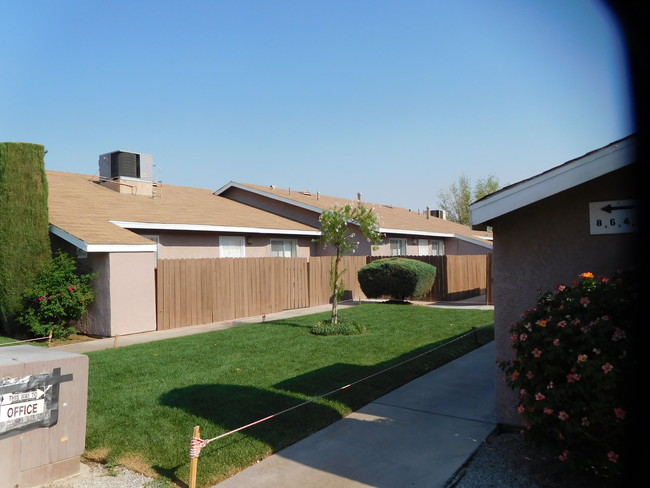 Desert Oasis Apartments in Adelanto, CA - Building Photo - Building Photo