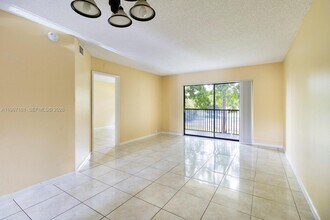 9044 NW 28th Dr in Coral Springs, FL - Building Photo - Building Photo