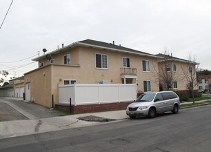 1128 Masselin/5669-71 San in Los Angeles, CA - Building Photo - Building Photo