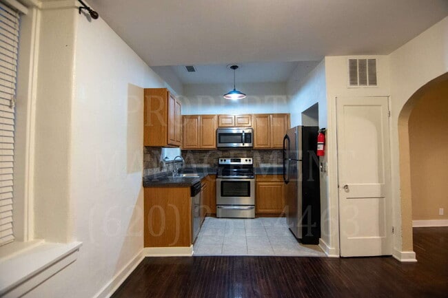 property at 112 1/2 R E Main St