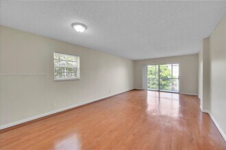 1100 NW 87th Ave in Coral Springs, FL - Building Photo - Building Photo