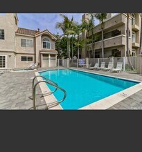 4581 Warner Ave, Unit 205 in Huntington Beach, CA - Building Photo - Building Photo