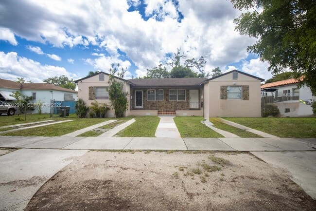 property at 5860 SW 9th St