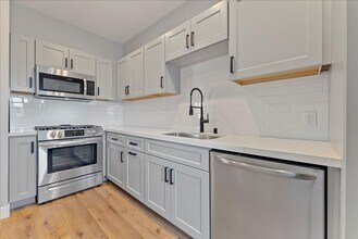 1259-1254 S Muirfield Rd in Los Angeles, CA - Building Photo - Building Photo