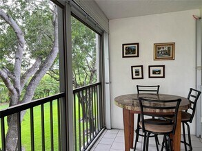 16500 Golf Club Rd in Weston, FL - Building Photo - Building Photo