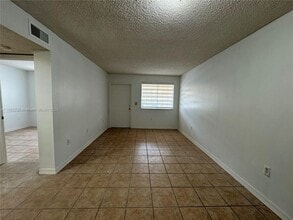 7497 W 22nd Ave in Hialeah, FL - Building Photo - Building Photo