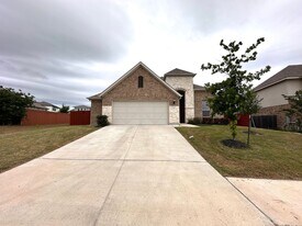 295 Oleander Loop in Mustang Ridge, TX - Building Photo