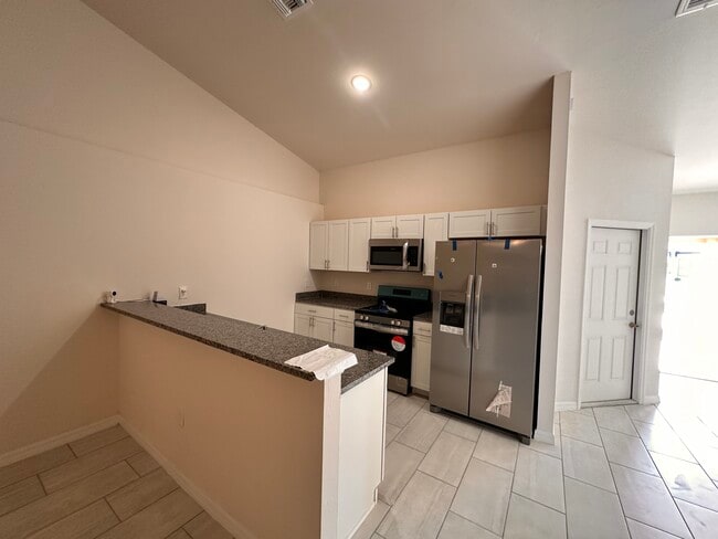 1449 SE 10th Terrace in Cape Coral, FL - Building Photo - Building Photo