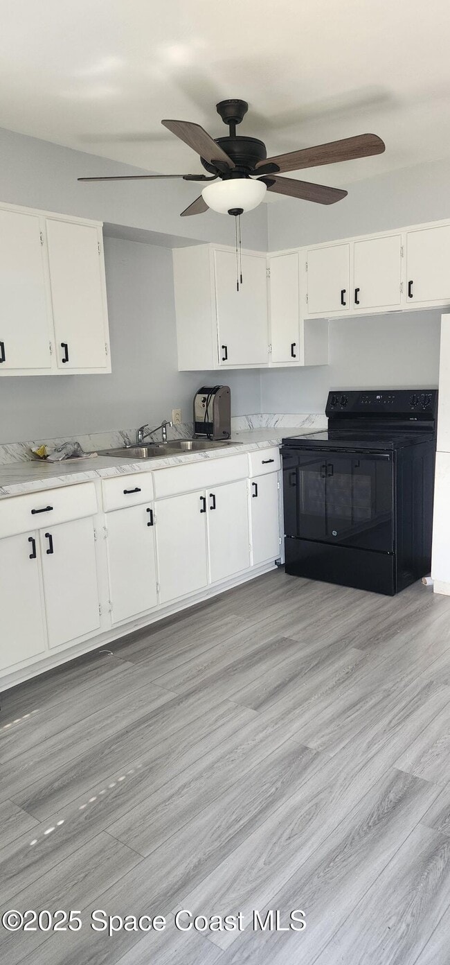 145 E Alachua Ln in Cocoa Beach, FL - Building Photo - Building Photo