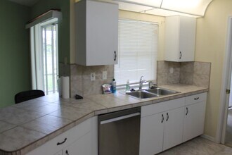 1114 Presque Isle Dr in Port Charlotte, FL - Building Photo - Building Photo