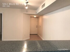 5041 Wiles Rd-Unit -#9-103 in Coconut Creek, FL - Building Photo - Building Photo